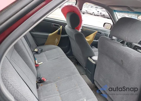 2000 Toyota Camry Le z USA, uszkodzony, nr VIN JT2BG22K7Y0449890